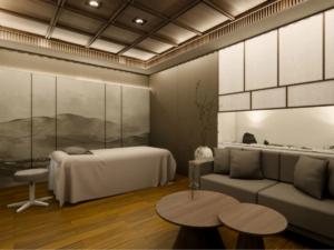 Himedi wellness treatment room with a massage table, lounge seating, warm wood finishes, and a mountain mural.